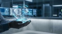 Businessman hand holding glowing digital globe with network connections in modern office environment, representing global business, technology innovation, and worldwide digital communication.