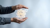 Businessman hands protecting glowing gear mechanism symbol representing business process optimization and workflow management solutions.