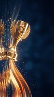 Golden trophy with wings and star design surrounded by sparkling particles on dark blue background for awards ceremonies and achievement recognition.