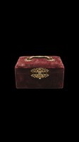 Vintage burgundy velvet jewelry box with ornate brass hardware, isolated on transparent background. Ready for clipart, print-on-demand, sublimation, t-shirt design, stickers, and digital crafts.
