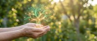 Open palm holding glowing tree sapling against blurred green nature background, symbolizing growth, environmental care, sustainability, and eco-friendly business concepts.