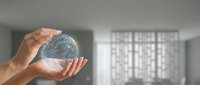 Young adult male hand holding glowing digital globe with network connections, representing global business, technology innovation, and worldwide connectivity in modern office environment.