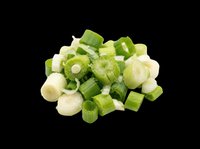 Chopped green onions pile isolated on transparent background, ready for food design, stickers, print on demand, T-shirts, clipart, and sublimation projects.