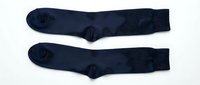 Pair of navy blue cotton dress socks laid flat on white background, isolated for fashion and retail use.