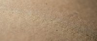 Fine golden sand texture with smooth granular surface for natural backgrounds and beach themed designs.