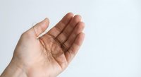 Open palm hand gesture showing empty cupped hand against white background, isolated for design use in presentations and communication concepts.