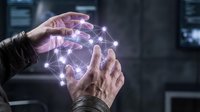 Hands holding glowing digital network hologram with connected nodes and lines, representing data connection, technology innovation, and future communication in modern business environment.