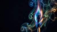 Silhouette of person surrounded by colorful energy aura with swirling light effects on dark background for spiritual and meditation concepts.