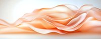 Smooth flowing peach-colored silk fabric creates gentle waves and folds against white background, showcasing luxurious textile movement and soft lighting effects.