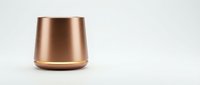 Metallic copper and gold cylindrical container isolated on white background, suitable for product mockups, packaging design, and commercial applications.