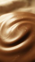 Smooth chocolate swirl with creamy texture and rich brown tones, ideal for confectionery, dessert, and food industry marketing materials.