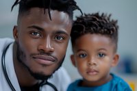 Young African American father and son sharing tender moment together, close-up portrait showing emotional connection and family bonding in casual home setting.