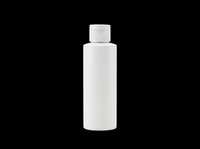 Blank white cosmetic bottle with flip cap isolated on transparent background, ready for product design, branding, and print-on-demand applications.