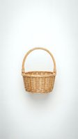 Empty wicker basket with handle isolated on white background for shopping, storage, picnic, gift packaging and home organization projects.