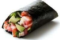 Fresh sushi hand roll with salmon, cucumber, and crab meat wrapped in crisp nori seaweed against white background, close up view of Japanese cuisine.