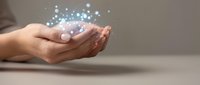 Female hands holding glowing digital particles and light effects, representing technology, innovation, data transfer, and digital transformation for business and communication concepts.