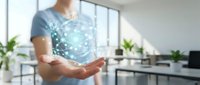 Caucasian male professional in casual business attire holding glowing digital network sphere in modern office environment with plants and windows, representing technology innovation and connectivity.
