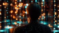 Young man silhouette from behind against glowing bokeh lights background in orange and turquoise colors creating magical atmospheric mood for festive designs.