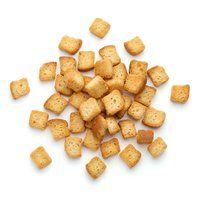 Crispy golden croutons isolated on white background, ready for salad toppings, soups, and culinary design projects.
