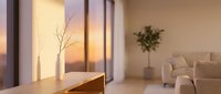 Modern minimalist living room interior with warm lighting, beige sofa, decorative branch in vase, and contemporary design elements for home decor inspiration.