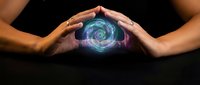 Protective hands surrounding glowing spiral energy orb with mystical light effects on dark background for spiritual healing concepts.