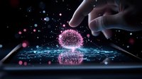 Hand touching glowing pink digital sphere on tablet screen with blue technology interface and bokeh light effects on dark background.