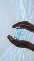 Hands protecting glowing network sphere with holographic data streams and digital connections for technology and innovation concepts.