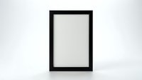 Black wooden picture frame with blank white space standing on white background, mockup for artwork, photo, or poster display.