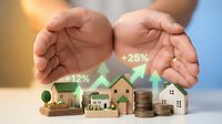 Hands protecting miniature houses and coins with growth arrows showing real estate investment returns and property value increase concept.
