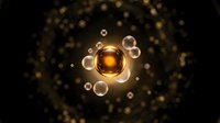 Golden atomic structure with glowing nucleus and orbiting electrons on dark background with bokeh lights for science education and molecular research.