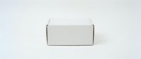 Closed white cardboard box with brown tape on neutral background, suitable for shipping, packaging design, and e-commerce mockups.