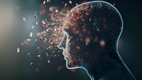 Male profile silhouette dissolving into glowing particles against dark background, representing mind, consciousness, artificial intelligence and digital transformation.