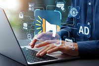 Digital marketing concept with businessman using laptop for online advertising campaigns and promotional strategies in modern office environment.