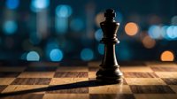 Black chess king piece standing on wooden chessboard with blurred city lights bokeh background creating dramatic atmosphere for strategic business concepts.