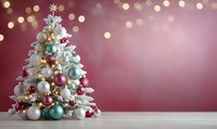 Festive white Christmas tree decorated with colorful ornaments in gold, silver, teal, and pink against burgundy background with bokeh lights.