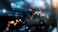 Financial market data visualization showing rising stock chart with blurred bokeh background, digital trading screen display for investment analysis.