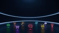 Colorful neon business icons glowing on dark futuristic surface with curved light horizon for digital marketing presentations and corporate designs.