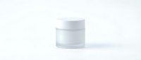 White cosmetic jar container with lid isolated on clean background for skincare product packaging and beauty brand design.