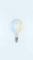 Glowing incandescent light bulb with visible filament isolated on white background for creative design projects and innovation concepts.