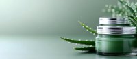 Luxury green cosmetic cream jar with aloe vera plant on mint background, natural skincare and organic beauty product for spa wellness routine.