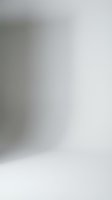 Abstract soft gray gradient background with smooth blurred transitions from light to dark tones creating minimalist atmospheric texture for modern design projects.