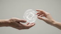 Two hands reaching toward glowing geometric sphere with interconnected lines representing digital connection, technology transfer and collaboration.