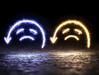 Glowing sad emoji faces in blue and gold light effects on dark reflective surface, depicting negative emotions and mental health concept for social media design.