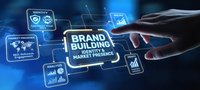 Professional hand touching digital brand building interface with holographic marketing icons and business analytics on blue technology background.