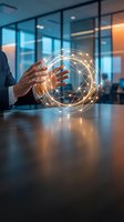Businessman holding glowing digital globe with interconnected network lines on office table, representing global connectivity, technology innovation, and international business communication.
