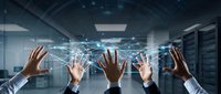 Business professionals manipulating holographic network connections in modern data center representing digital transformation and connectivity.