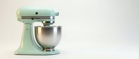 Mint green stand mixer with stainless steel bowl on white background, isolated kitchen appliance for baking, cooking, and food preparation projects.