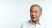 Senior Asian man with gray hair wearing light blue button-up shirt, looking thoughtfully to the side against white background for corporate and lifestyle use.