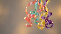 Colorful curly ribbons floating in air with soft bokeh background for party celebration decoration and festive event design projects.