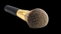 Fluffy powder brush with black handle and gold ferrule, isolated on transparent background, ready for beauty, cosmetics, T-shirt, sticker, and print on demand designs.